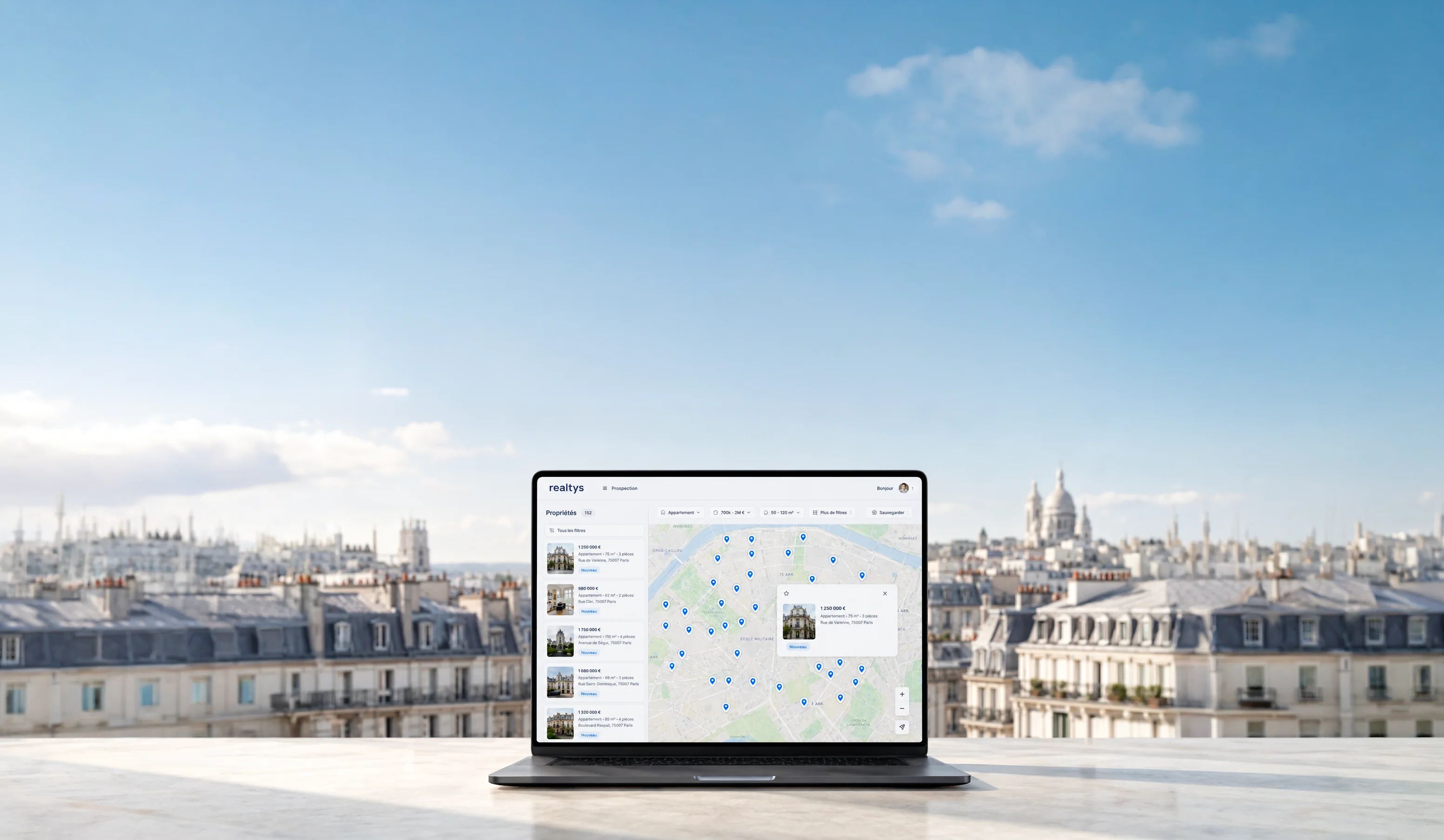 Agrégateur Realtys affiché sur ordinateur avec carte d'annonces immobilières